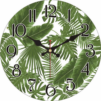 Orologio da parete con foglie tropicali