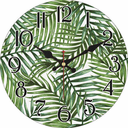 Orologio da parete con foglie tropicali