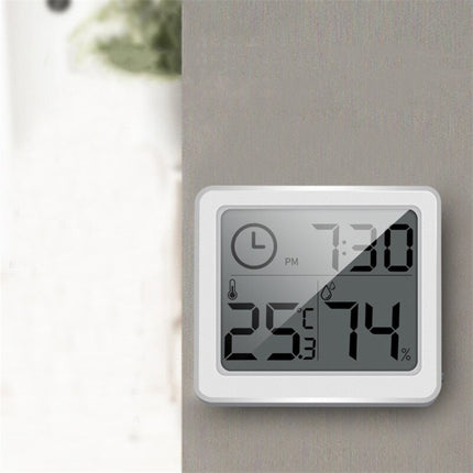 Orologio digitale da tavolo bianco con termometro