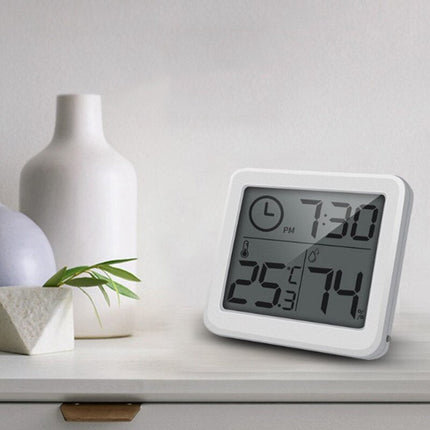 Orologio digitale da tavolo bianco con termometro