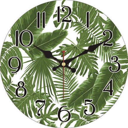 Orologio da parete con foglie tropicali