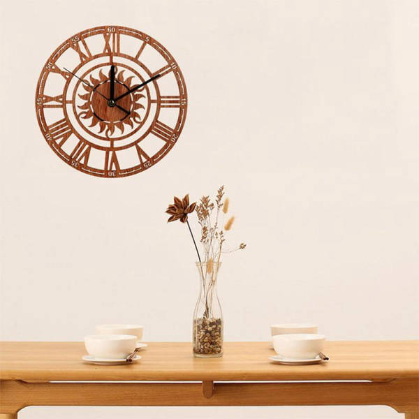 Orologio da parete in legno sole