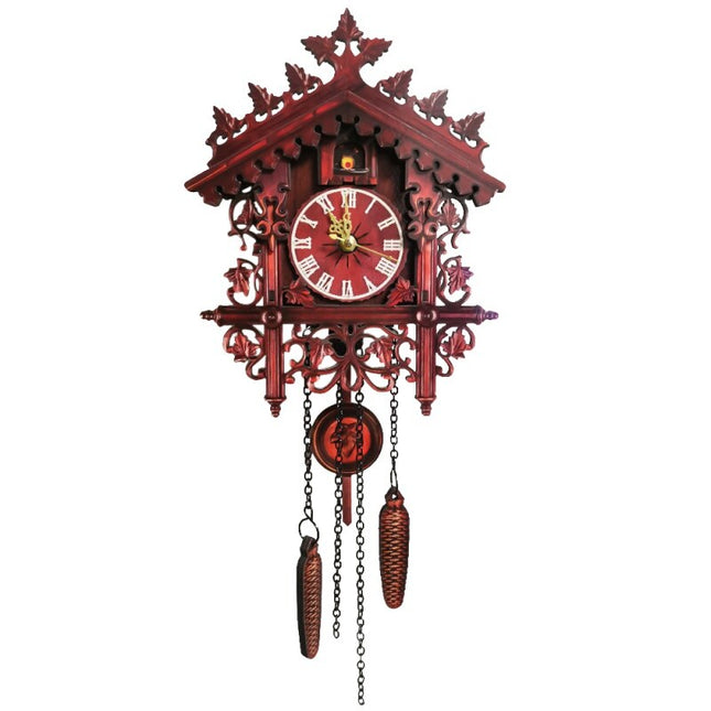 Orologio a cucù in legno intagliato