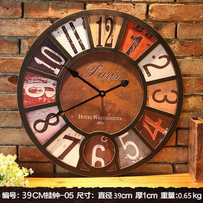 Orologio da parete vintage con farfalla