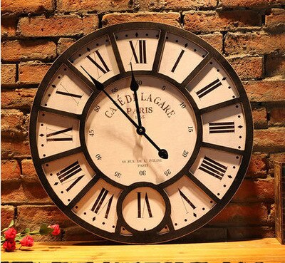 Orologio da parete vintage con farfalla