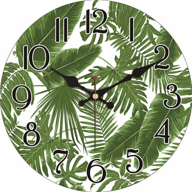 Orologio da parete con foglie tropicali