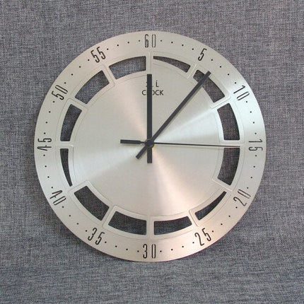 Orologio da parete minimal in metallo