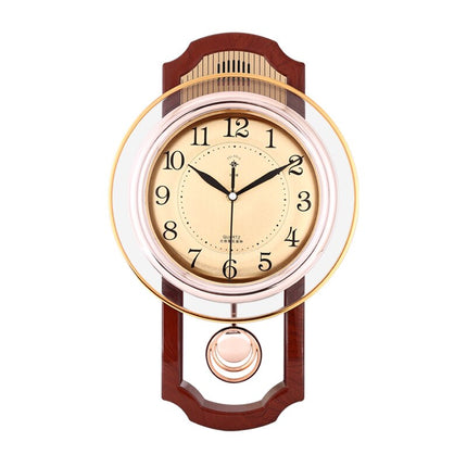 Orologio a pendolo vintage finitura dorata