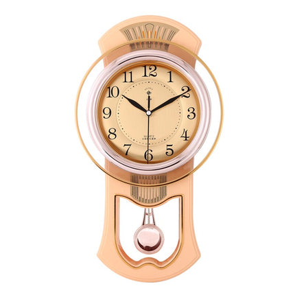 Orologio a pendolo vintage finitura dorata