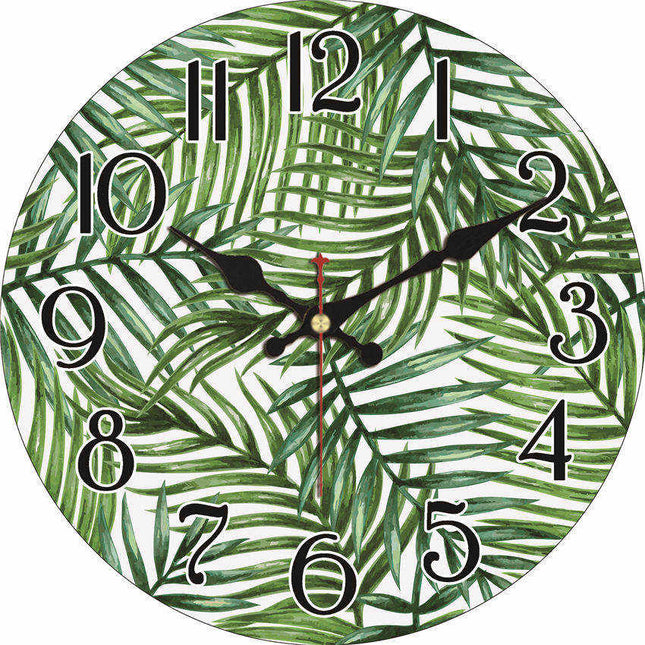 Orologio da parete con foglie tropicali