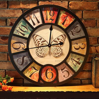 Orologio da parete vintage con farfalla