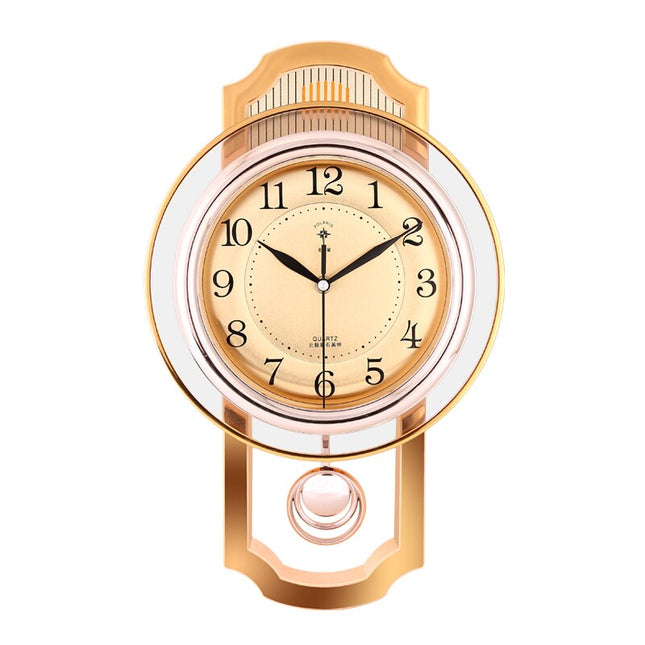Orologio a pendolo vintage finitura dorata