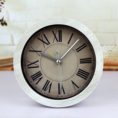 Piccolo orologio vintage rotondo da tavolo