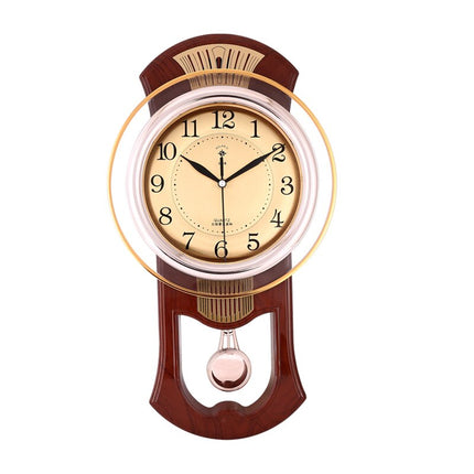 Orologio a pendolo vintage finitura dorata