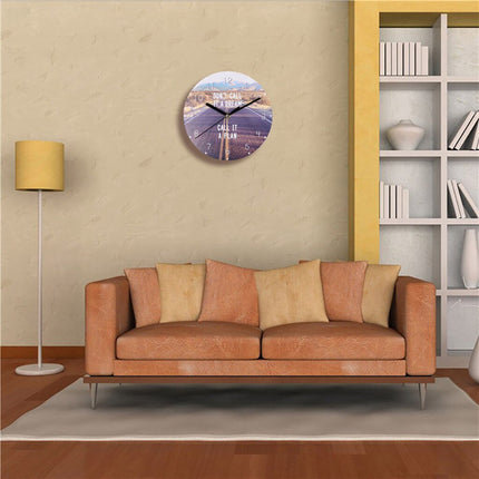 Orologio da parete con frase motivazionale