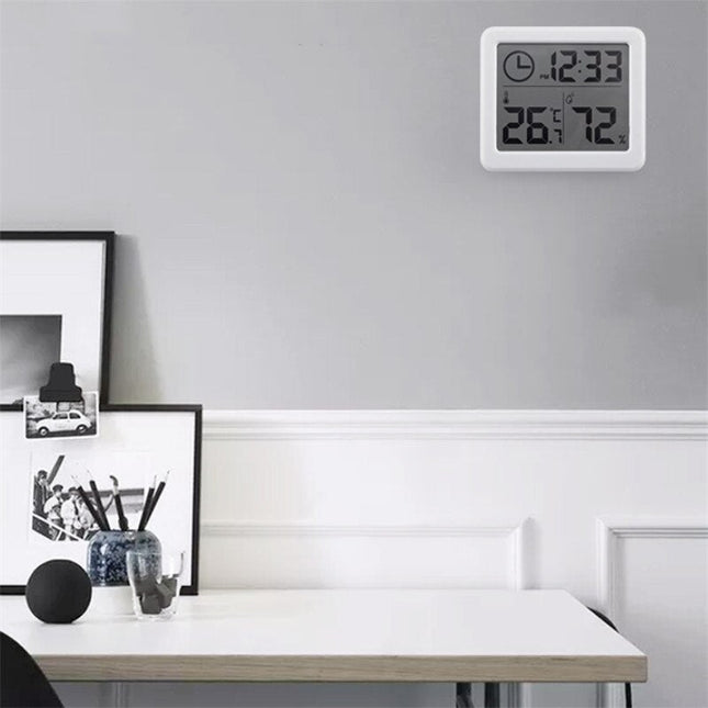 Orologio digitale da tavolo bianco con termometro