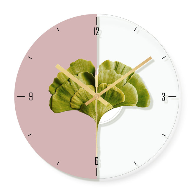 Orologio da parete con foglia dorata