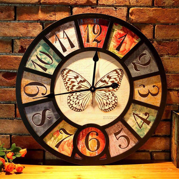 Orologio da parete vintage con farfalla