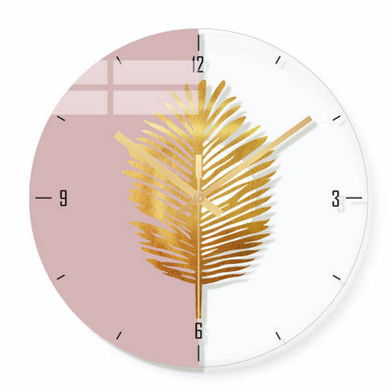 Orologio da parete con foglia dorata