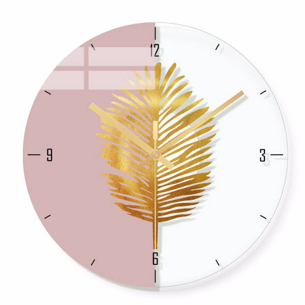 Orologio da parete con foglia dorata