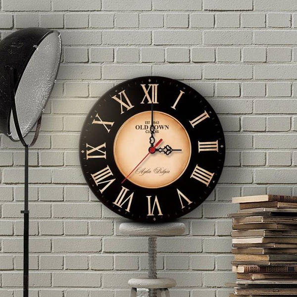 Orologio da parete vintage nero e oro